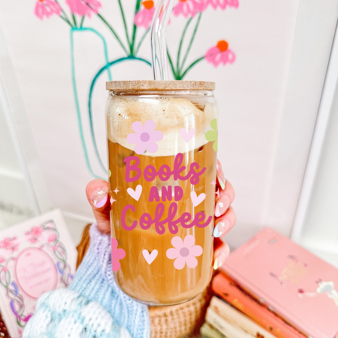 Drinking glass with straw | Books and coffee